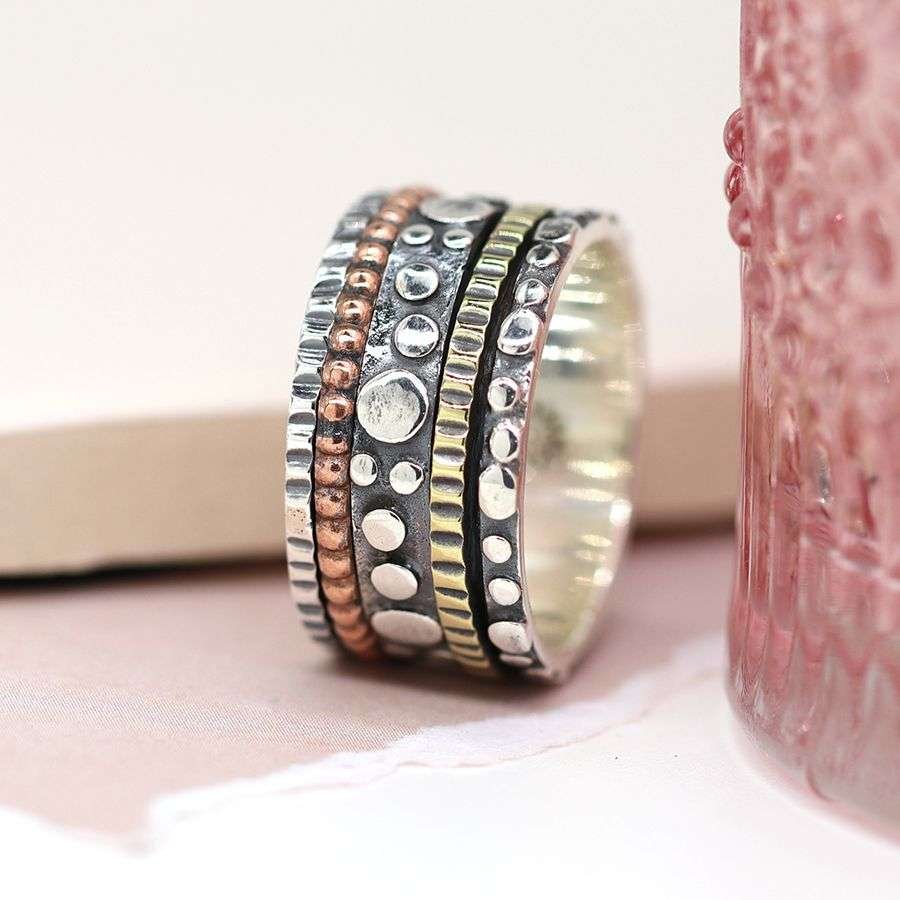 Sterling silver brass and copper spinning ring in a bubble design