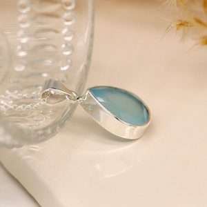 Sterling silver teardrop pendant with faceted semi-precious chalcedony gemstone on a silver chain, complete with extension to adjust the length.