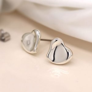 Silver plated heart stud earrings with a gentle wave surface and polished finish