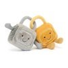 A pair of soft toy padlocks with cute smiley faces locked together. One in silver fur, the other gold