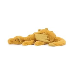 A golden coloured cuddly dragon from Jellycat. In a laying down position with a cute face sparkly wings and a long furry tail