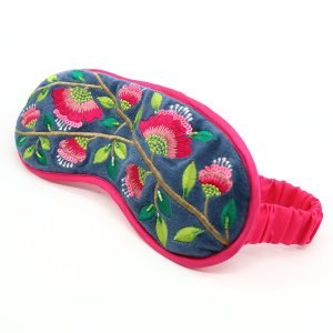 Velvet and satin sleep mask in rich teal with floral embroidery and elasticated head strap
