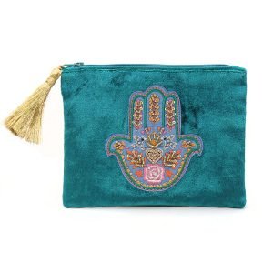 Rich teal velvet purse with embroidered and embellished hand of Fatima and a golden tassel zip
