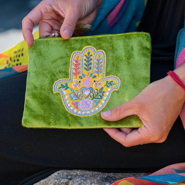 Rich lime green velvet purse with embroidered and embellished hand of Fatima and a golden tassel zip