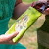 Rich lime green velvet glasses case with embroidered and embellished hand of Fatima
