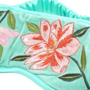 Turquoise velvet sleep mask with elasticated satin head strap and pretty pink floral embroidery