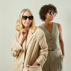 2 women models wearing Square lens sunglasses with smokey grey frame