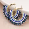 Golden hoop earrings with blue mix striped multi bead fan detail