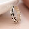 Sterling silver fine band spinning ring with gently hammered moving band