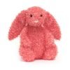 A holly berry red fluffy soft bunny from Jellycat