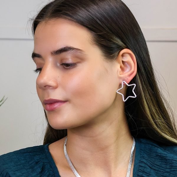 Silver plated worn open star earrings