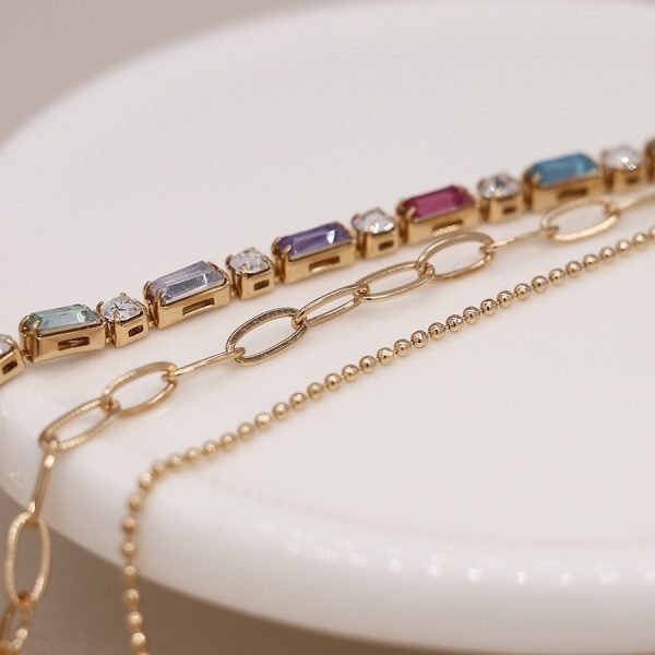 Golden multicoloured crystals and chains necklace