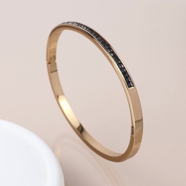 Golden black crystals hinged bangle