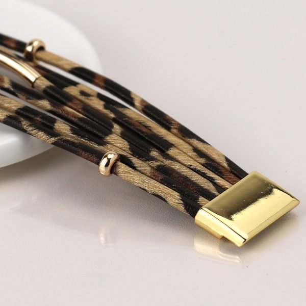 Multistrand leopard print and golden element bracelet